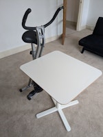 Small table and exercise bike collected by Rid Junk Ltd