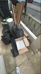 rubbish, box, tiles, electric boxes, bin bags, Electrical’s (garden leaf blower and hair tools, small box of tiles, stone stool, wood floor offcuts. Must be gone today and everything gone E11 - removed for £70