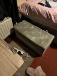 Miscellaneous junk Dismantled wardrobe, piece of kitchen worktop, plastic animal cage tray, cardboard, broken ottoman B79 - removed for £180