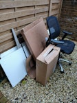 N10 1nd asap A flatpack (disassembled) closet, desk chair, couple of boxes, and picture frame. N10 - removed for £60