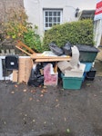 Rubbish to be collected general house hold waste, plastic boxes old toys bin bags to be removed CR0 - removed for £65