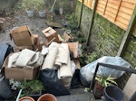 carpet and cardboard boxes Mostly carpet off cuts, empty cardboard boxes and old wooden floor boards. N1 - removed for £210