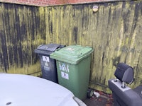 Wheelie bins gray and green collected by Achut Ltd