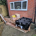 Wooden pallets&Tesla clamshell Wooden pallets, cardboard and solar panel packaging along with Tesla clamshell SO16 - removed for £80