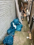 Wood, cardboard, green waste Garden green waste in blue plastic bags, builders rubble (mainly wood) and cardboard. SW11 - removed for £170