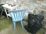 wood, plastic, old chair As in photos, old table and chairs, wood, plastic bags and buckets. Can be taken out of garden gate. E9 - removed for £60