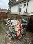 Rubbish & contents of 2 sheds mixed household rubbish as shown in driveway plus contents of two small/medium sheds. HA9 - removed for £295