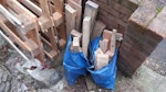 6 pallets + timber offcuts 6 x pallets, 2 bags of timber offcuts, a handful of loose timber offcuts and one small bag of masonry/mortar rubble. E15 - removed for £80