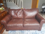 2 leather sofas 1 leather armc 2 leather sofas and 1 leather armchair with some wear LS14 - removed for £180