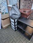 cardboard and cupboard couple of bin bags, an old hoover, small cupboard, plastic drawers and some cardboard boxes. M23 - removed for £60