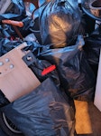 electrical waste 11 bags of electrical waste- smoke alarm, light bulbs, bulkheads, extractor fans, switches, sockets, 1 bag of toys, 1 christmas tree 5ft without decorations, 2x 5ft batten lights N14 - removed for £85