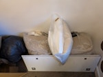 Cardboard, bags, glass sheets Cardboard box ~2 metres in length, stuffed with other cardboard pieces. 5-6 bags of mixed rubbish (pillows, packaging). 2 glass sheets, ~1.5 m x 0.5 m. W5 - removed for £75