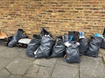 bags of rubbish broken items rubble bags couple boxes and stereo separates NW2 - removed for £65