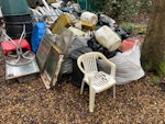 Large Amount Of Various Waste Plastic: table, pots, bottles, chair, compost bins, guttering, waste bin, tarpaulin, fencing, flooring, water pipe, boxes, netting, sheets etc.

Glass: window, table, bottle, broken, etc.

Capet, cushions, felt, insulation etc.

Many various waste products - no metal / scrap.

Access is restricted for larger vehicles (see photo). BH23 - removed for £380