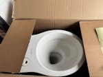 old toilet in a cardboard box old toilet in a box as just had toilet replaced TW8 - removed for £45