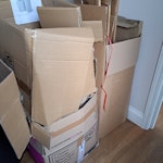 Moving boxes + 2 rubbish bags 4 boxes of broken down cardboard moving boxes
1 recycling bag of smaller cardboard pieces / paper
1 rubbish bag of used bubble wrap
1 three-tiered plastic container unit N5 - removed for £60