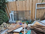 Windows, building&garden waste Some rubble loose and in bags, old flooring boards. FREE good quality double glazed windows, not broken, removed gently. Garden waste packed. Large bag of sand staying as shown on photos. Pots also staying. SW16 - removed for £325