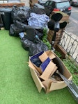 9 black bags of household item 9-10 bags of household items plus one cardboard box , one fan stand NW6 - removed for £70