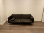 Two seater brown sofa. The sofa is in good condition - will need to be cleaned. E5 - removed for £75