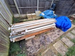 Hippo bags of soil wood slabs Dismantled outhouse planks of wood, three 10L buckets of soil and 2 small-medium Hippo bags of rubble and chip board, 8 breeze blocks, at least 26 yorkshire stone paving slabs. Some stuff could be reused, however much of the wood is sodden. Soil is clay and brick from the garden. RH15 - removed for £250