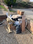 Building waste, bags, timber. Building waste from a garden building. Off cuts, timber, plastic, plasterboard, ply, rubber, SG4 - removed for £110