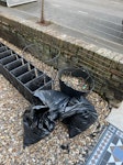 metal soil and rocks three bags of soil. a bucket full of rocks (same rocks as on the floor). some metal wire and a plastic shoe rack E10 - removed for £60