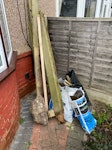 A bit of soil, wood, rubble Rubbish produced from fence posts replacement DA15 - removed for £50