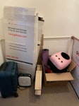 Various homewares & boxes Includes some clothing, various homewares, a laptop, new suitcase & other unopened, new items. Reusable moving boxes and some recycling/rubbish. SE4 - removed for £50