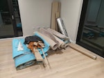 Carpet, underlay, bag of rubbl Carpet and underlay (in good state), bag of laminate trim and a cardboard tube. In flat, 3rd floor with elevator access E16 - removed for £110