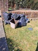 3 fence panels, wood,black bag collected by Advance Waste