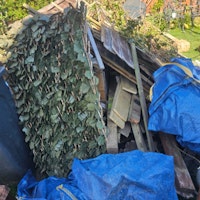 Wood and small concrete post collected by T & O waste services