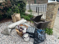 chairs, rug, empty p aint tins collected by Advance Waste
