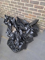 bags of rubble/ broken slabs collected by Rubbish Clear Away