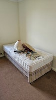 Single divan trundle bed collected by NES DOMESTIC AND COMMERCIAL SOLUTIONS
