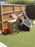 Wood, cardboard, garden Fence panels, shed broken down, lots of cardboard. Some bits of metal with hinges in there and few other small bits. KT12 - removed for £100