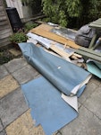 flooring from 2 room and some The rubbish in the back garden needs removing!  The street's on the other site of the garden E2 - removed for £120