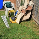 old carpet, broken lawn mower, blind, x2 post mix, 3 plastic garden chairs, broken lawn mower, carpet, hose, hanging planter. CR5 - removed for £70