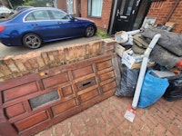 Front door, rubbish, etc collected by Universal N&D LTD
