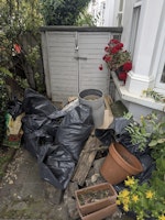 small shed and garden waste collected by Quick Junk