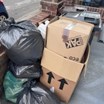 cardboard and packing material please remove the large stack of broken down cardboard boxes behind the bins, the 5 black garbage bags and 2 cardboard boxes filled with packing material, the bit of styrofoam, the metal bin, carpet roll, and floor samples. DO NOT take the bike, the bins, or the black cover under the bike (those belong to our neighbour). E5 - removed for £65