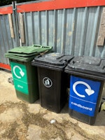 Empty 3 bins mixed house waste collected by Waste Machine