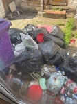 10+ bin bags from backyard Approx. 12 black bin bags with general rubbish from the backyard. No bulky items, no builder waste. Bags are tied and ready for collection. Easy access via front or side. L8 - removed for £45