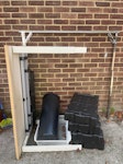 Table, 2 plastic bins Table, 2 plastic bins, white mesh basket, 4 styrofoam packaging blocks, 1 metal dryer rack, office chair TW1 - removed for £85
