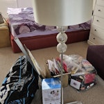 Bag of handbags & box of books Hardback & paperback books. Noteboooks. Handbags and board games. Not sure what the long poles are. I've added 2 additional items. A floor lamp and a humidifier. Can leave outside the property. TW3 - removed for £25