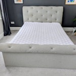 Upholstered Bed The frame is in really good condition. The mattress is thin and usable. There
is one circular stain on the mattress, which can be covered with a mattress protector. S11 - removed for £80