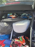 Boot load of rubbish + old sto collected by waste management group