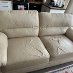 Sofa (White faux leather) Comfy white faux leather sofa. Seats 2-3. It is ripped but this can be covered easily. BN1 - removed for £80