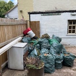 Fridge chair garden waste Under counter fridge, arm chair, plastic pots/ boxes, garden waste B30 - removed for £120