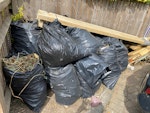 garden waste & wood offcuts approx 10bags of mixed garden waste plus some long planks and offcuts from a garden project. all on the left hand side of the front garden, easy access for loading SW20 - removed for £150