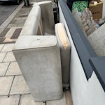 sofa, plywood, cardboard jeans 1 sofa small bit of plywood a cardboard box with one breeze block and some old jeans EN8 - removed for £200